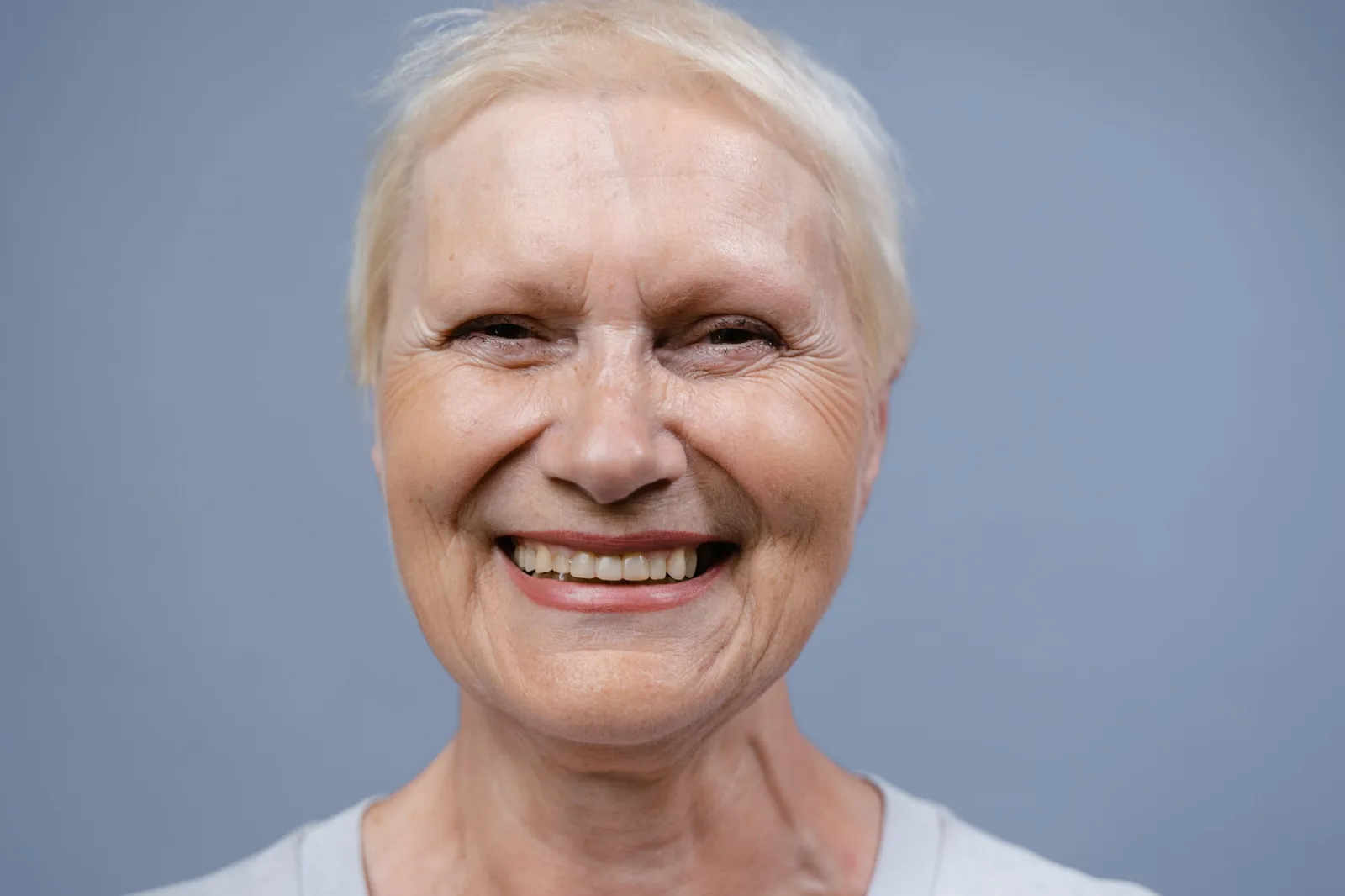 Older patient smiling in the dental chair