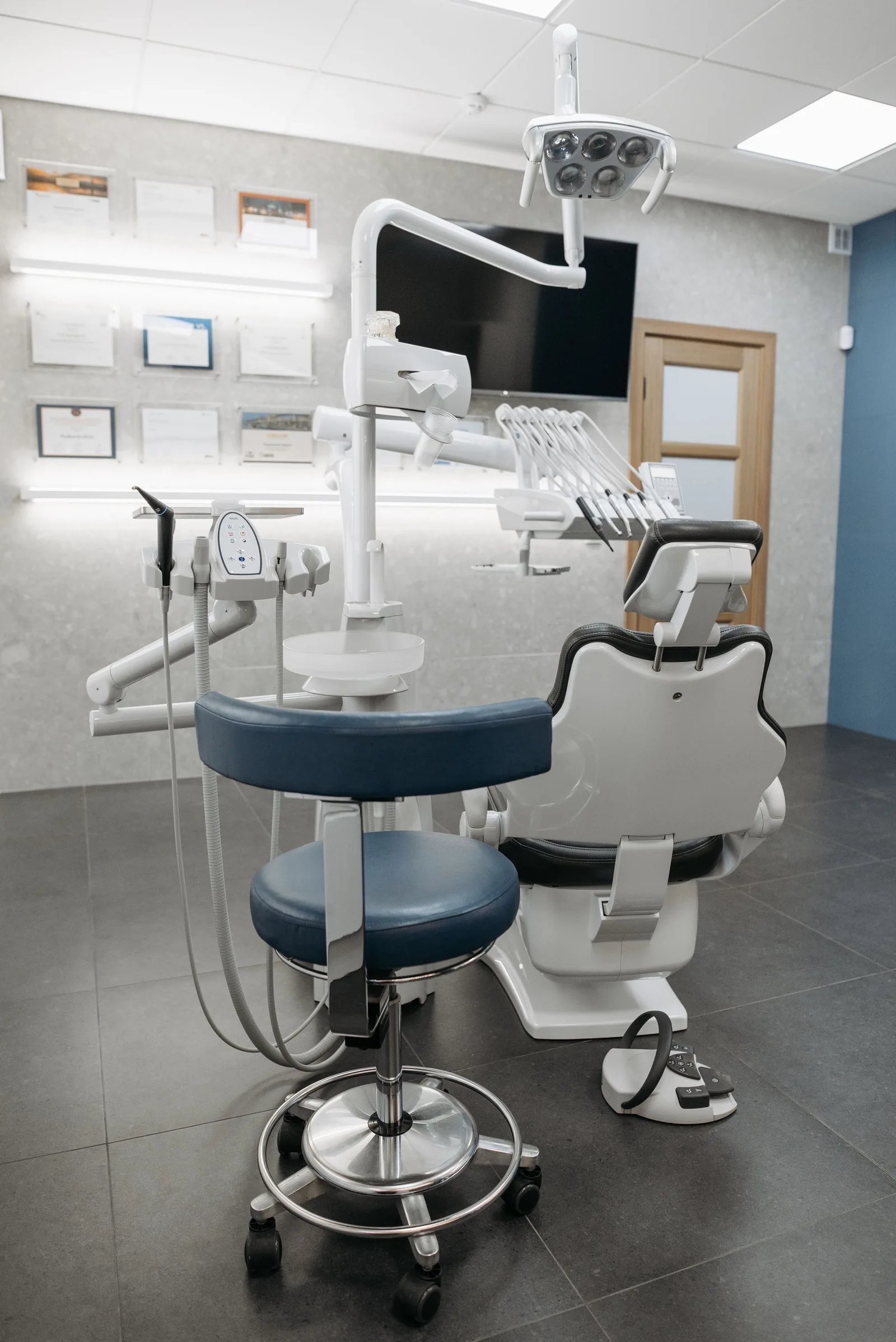 Dental chair in a bright treatment room